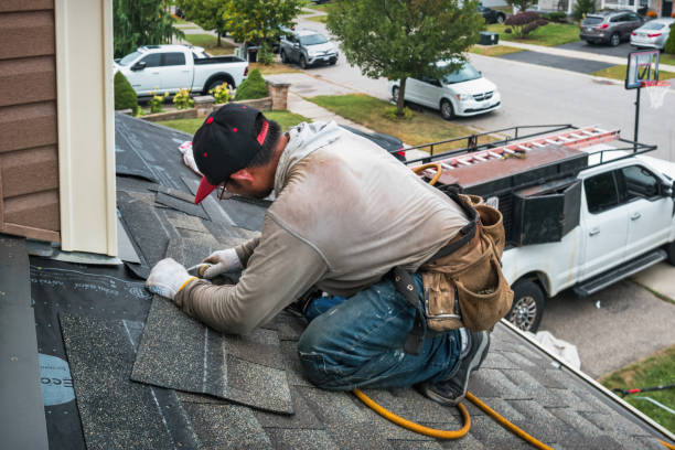 Professional Storm Damage Roof Repair technician working in Highspire, PA